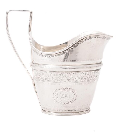 An American silver oval cream jug and sugar basin by Alexander Gordon