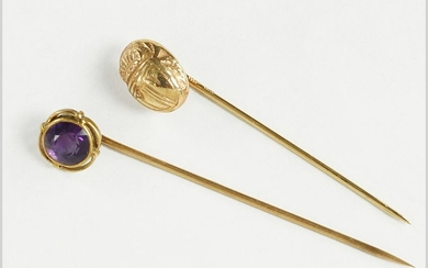 An Amethyst and 14 Karat Yellow Gold Stick Pin.