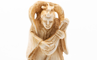 An Antique Japanese Carved Ivory Netsuke of a Shamisen Player, 19th Century