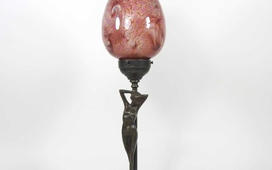 An Art Nouveau style table lamp, with a mottled glass...