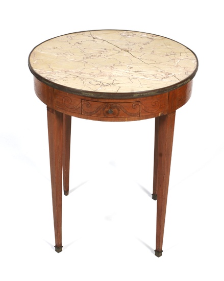 An Edwardian Sheraton Revival marble topped circular table. The cream marble top with red and pink striations within gilt metal rim, the frieze inlaid with interlocking scrolls, before a drawer, on tapering square legs, 60.3cm diam. x H73.5cm