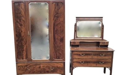 An Edwardian mahogany dressing table and wardrobe, the dressing chest...