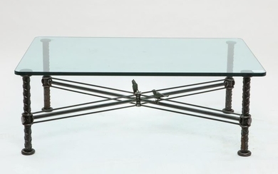 An Ilana Goor iron and plate glass coffee table