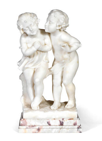 An early 20th century Italian carved alabaster figural group of two playful children