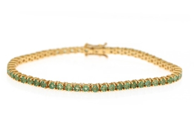 An emerald bracelet set with numerous circular-cut emeralds, totalling app. 4.23 ct., mounted in 18k gold. W. 3 mm. L. 18 cm.