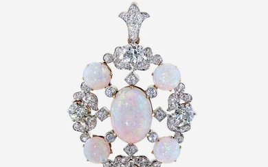 An opal, diamond, and eighteen karat gold pendant