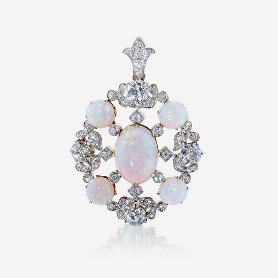 An opal, diamond, and eighteen karat gold pendant