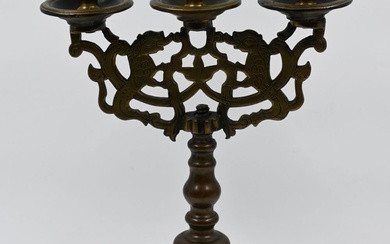 Antique Shabbat candlestick with three reeds, made of brass....