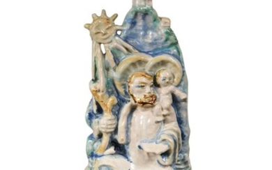 Attributed to Michael Powolny, a Wiener Werkstatte hand painted pottery model of St Christopher