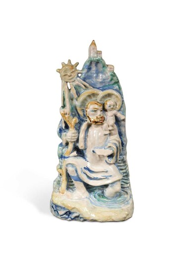 Attributed to Michael Powolny, a Wiener Werkstatte hand painted pottery model of St Christopher