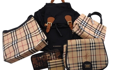 BURBERRY, A RUCKSACK; THREE HANDBAGS; AND TWO PURSES (6)