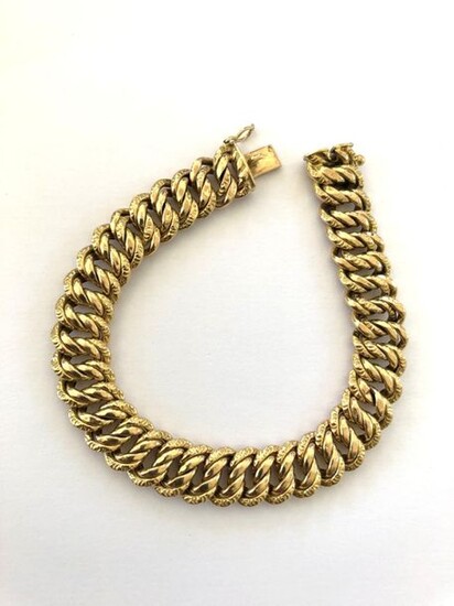 Bracelet in yellow gold 750 thousandths American stitch 18.3 g, length 18 cm.