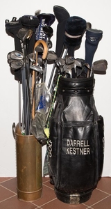 [CASSINI-GOLF] Group of approximately thirty golf clubs and two golf bags.