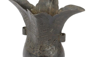 Chinese ancient bronze Gu vessel with archaic relief
