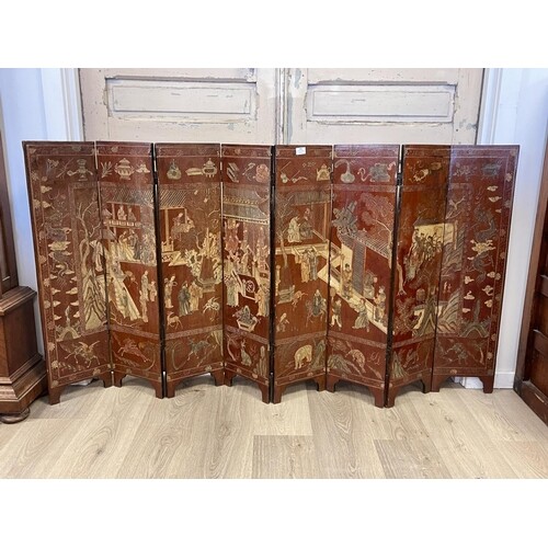 Chinese eight fold screen, carved and incised decoration, sh...