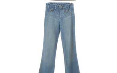 Chloé: A pair of blue jeans with straight legs, two pockets on the front with buttons, two back pockets and belt loops. Size 36 (FR)