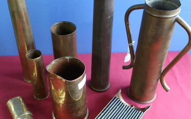 Collection of trench art and shell casings, including vases,...