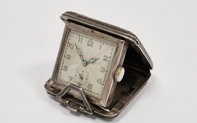 Early 20th century silver-cased folding watch housed in a le...
