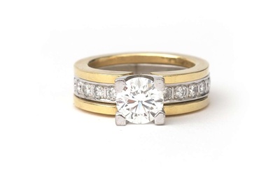 Een 18 krt. gouden bi-colour solitair ring met diamant, ca. 2.09 ct.