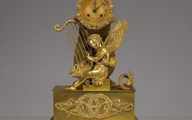 Empire clock in gilt bronze musician cherub