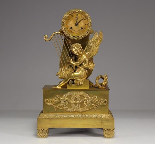 Empire clock in gilt bronze musician cherub