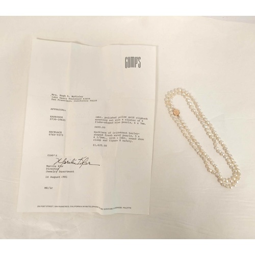 Freshwater pearl necklet on 14k gold snap.