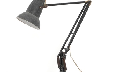 George Carwardine “Anglepoise”. Black-lacquered metal task lamp with adjustable arm. Manufactured and...