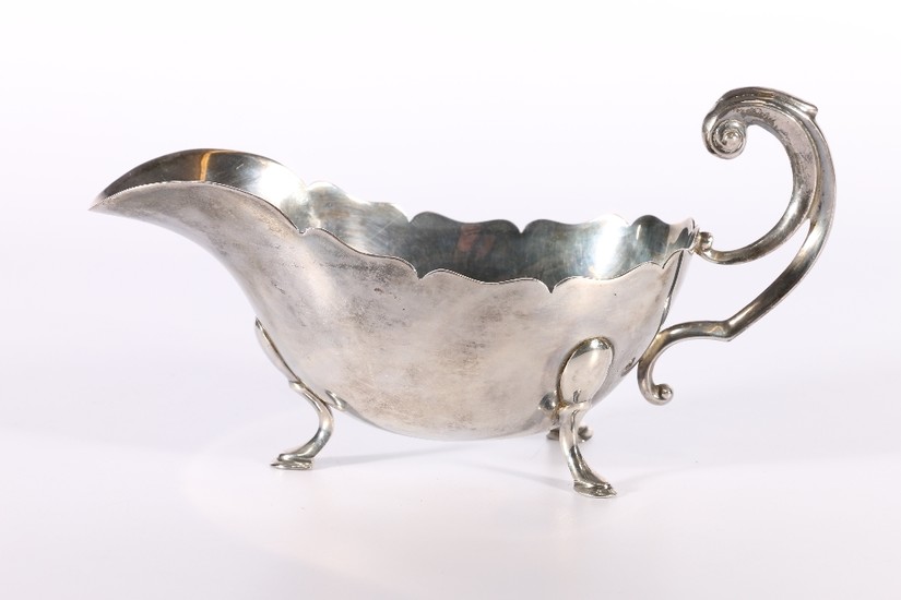 George V Art Deco period silver sauce boat with scroll handl...