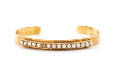 Gold rigid bracelet with pearls