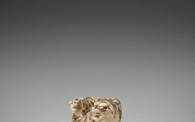 HAKURYU: AN IVORY NETSUKE OF A TIGER WITH TWO CUBS