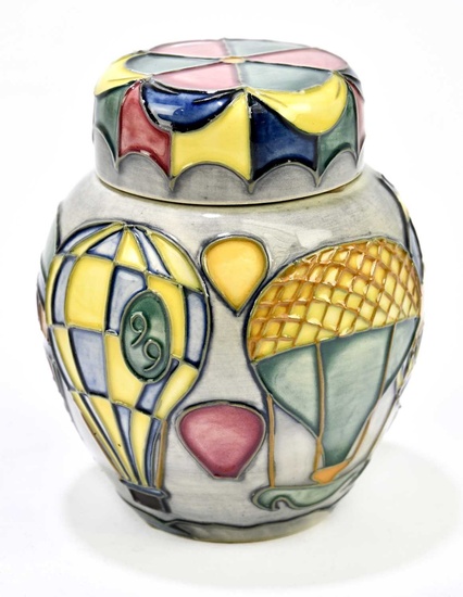 JEANNE MCDOUGALL FOR MOORCROFT; a small ginger jar and cover...