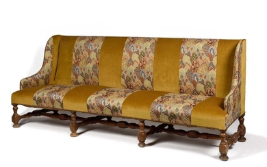 Large walnut winged sofa, the base turned with balusters and spacers, covered with velvet and tapestry strips to the point. 19th century. H : 102 cm, W : 242 cm Provenance : Château de La Roche-Guyon