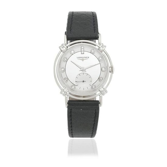 Longines. A 14K white gold diamond set manual wind wristwatch Circa 1985