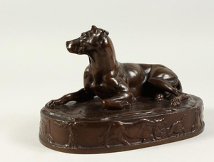OUDIN, A SMALL FRENCH BRONZE OF A RECLINING DOG