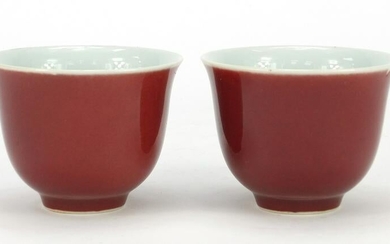 Pair of Chinese porcelain sang de boeuf glazed tea