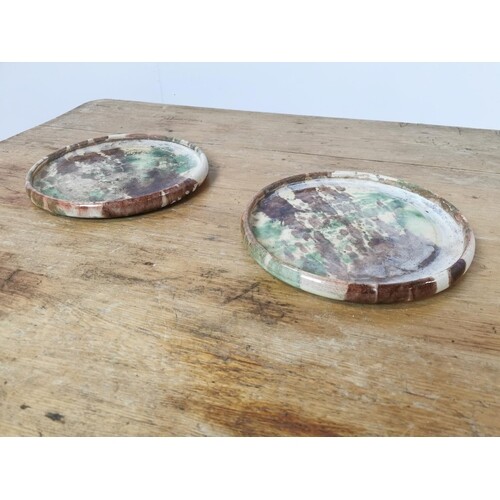 Pair of glazed terracotta platters {30 cm Dia.}.