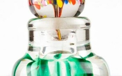Paperweight type glass scent bottle enclosing lily in