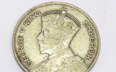 Pièce en argent de 1/2 couronne "Georges V" (Nouvelle-Zélande), datée de 1934. Poids : 14g14....