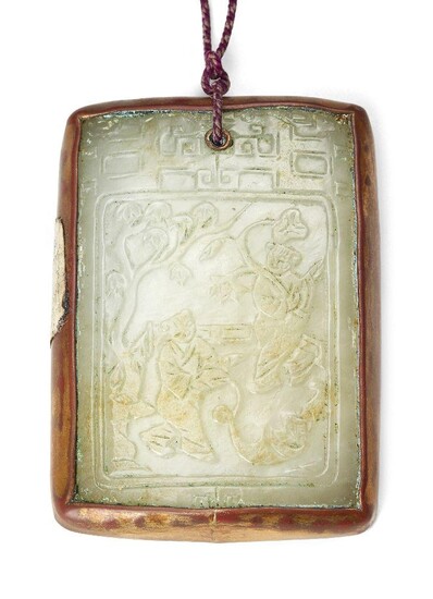 Property of a Gentleman (lots 36-85) A Chinese pale green jade rectangular pendant plaque, Qing dynasty, finely carved in low relief to one side with two boys in a fenced garden beneath an archaistic dragon border and with a poem to the reverse...