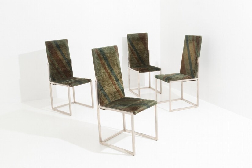 Quattro sedie in metallo cromato con sedute e schienali...
