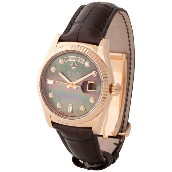 Rolex. Charismatic and Colorful Day-date Automatic Wristwatch in Pink Gold, Reference 118 135, With Mother of Pearl Dial, Full set, Additional Brown Dial and Diamond-Ruby Set Dial.