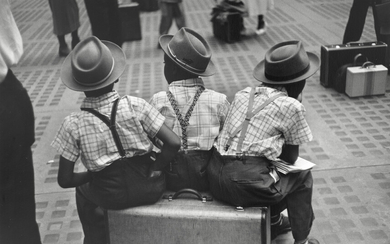 Ruth Orkin (1921-1985) Three Boys on Suitcase, Penn Station, NYC