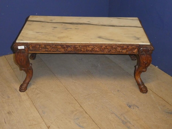 Small marble topped coffee table, with carved wooden frieze ...