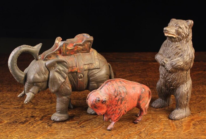 Three Early 20th Century Cast Iron Animal Money Banks: An American mechanical bank by Hubley Manufac