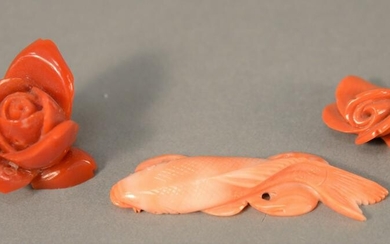 Three carved pieces of coral, large red coral rose