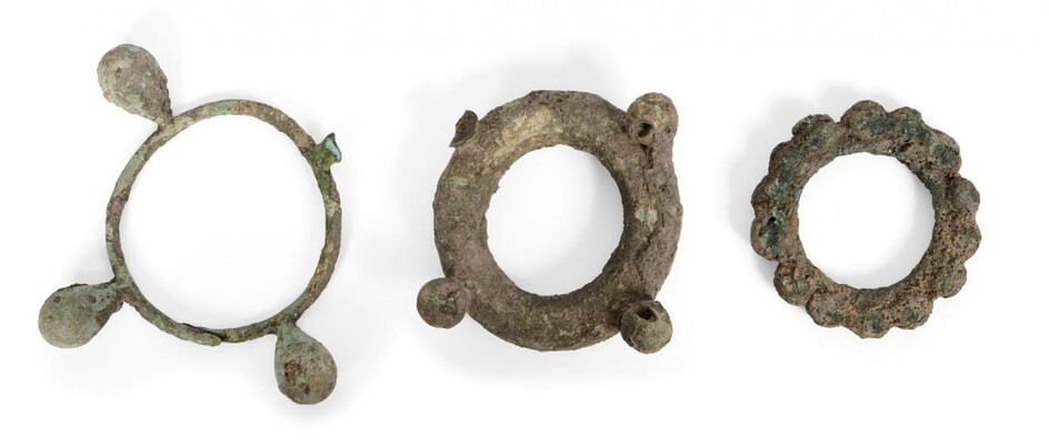 Three large Chinese bronze bracelets, Neolithic period, each cast with...