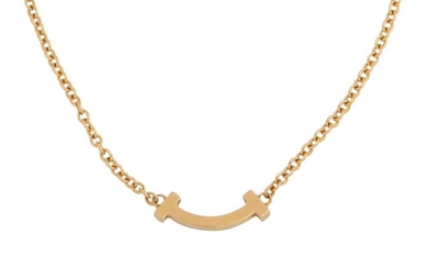 Tiffany & Co. | A gold 'Tiffany T Smile' bracelet
