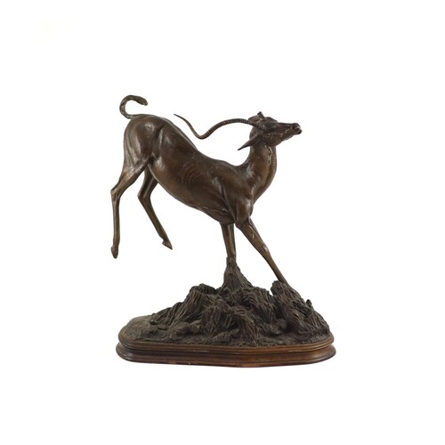 Tim Nicklin. A bronze model of a bucking impala running upon...