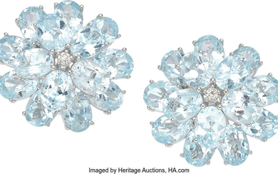 Topaz, Diamond, White Gold Earrings Stones: Oval-shaped topaz weighing...