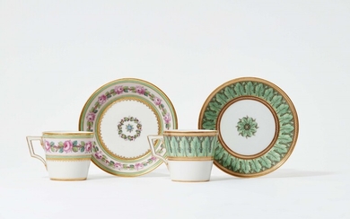 Two Berlin KPM Neoclassical porcelain cups and saucers